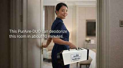 Housekeeper walking into room carrying PurAire DUO