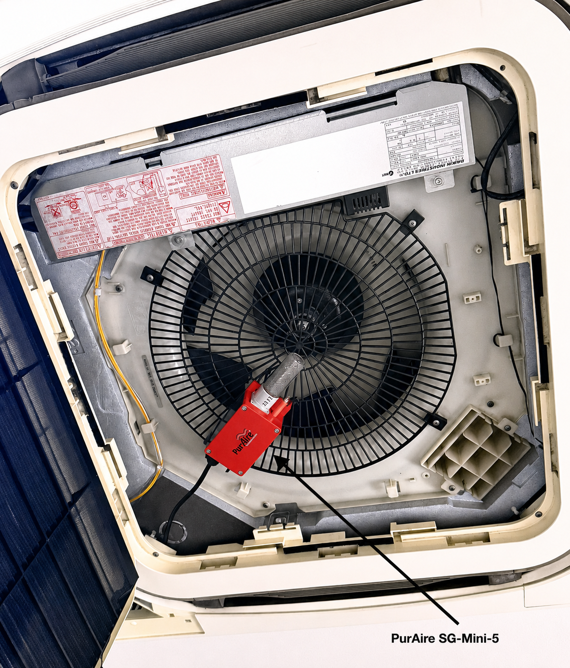 The PurAire SG-Mini-5A ionizer installed in a cassette air con.